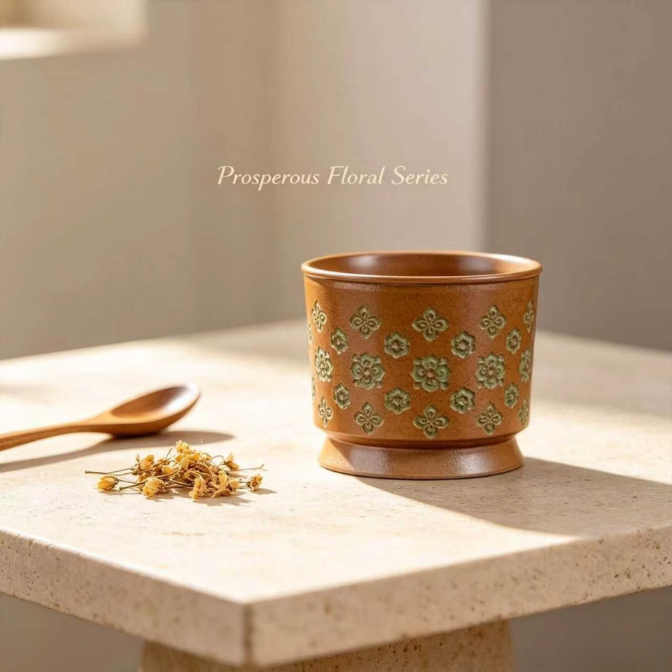 Wide Base Cylindrical Embossed Flower Tea Mug